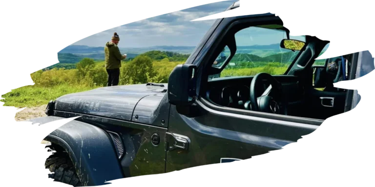 Jeep Tours with person overlooking the New River Gorge in West Virginia